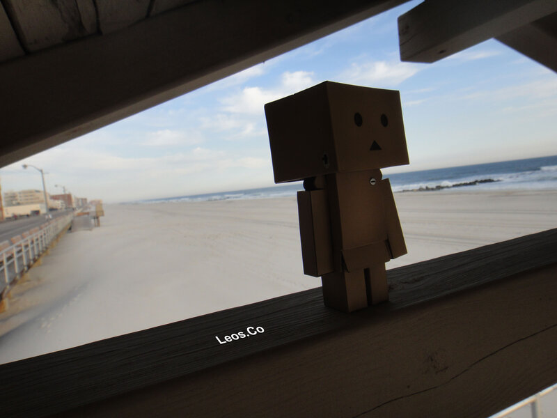 Cardboard Figure on Railing