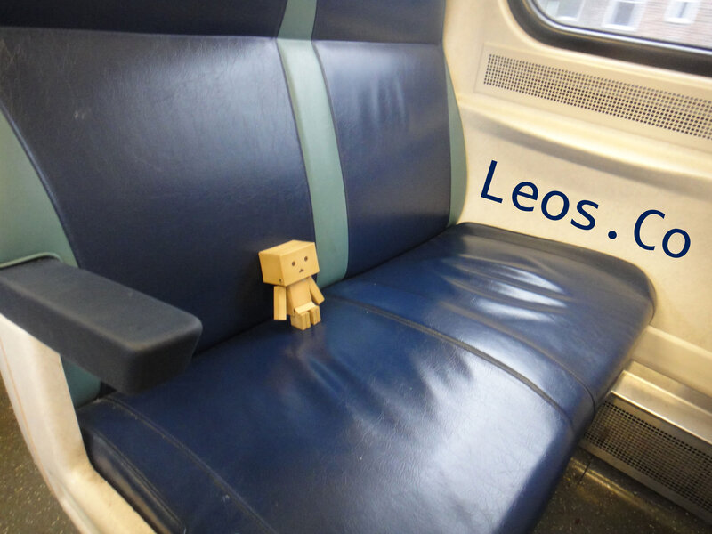 Cardboard Figure on Train Seat