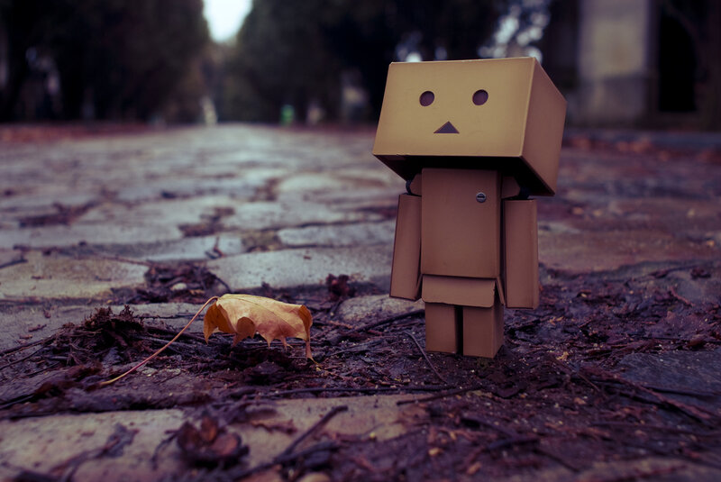 Cardboard Robot Figure — Brown, Melancholic, Autumn, Photograph, Leaf, Pavement