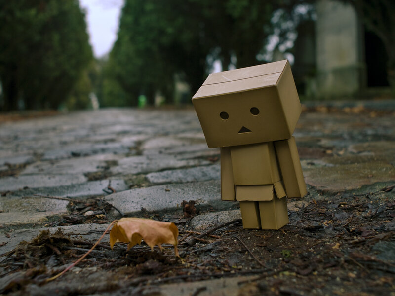 Cardboard Robot Figure — Brown, Melancholic