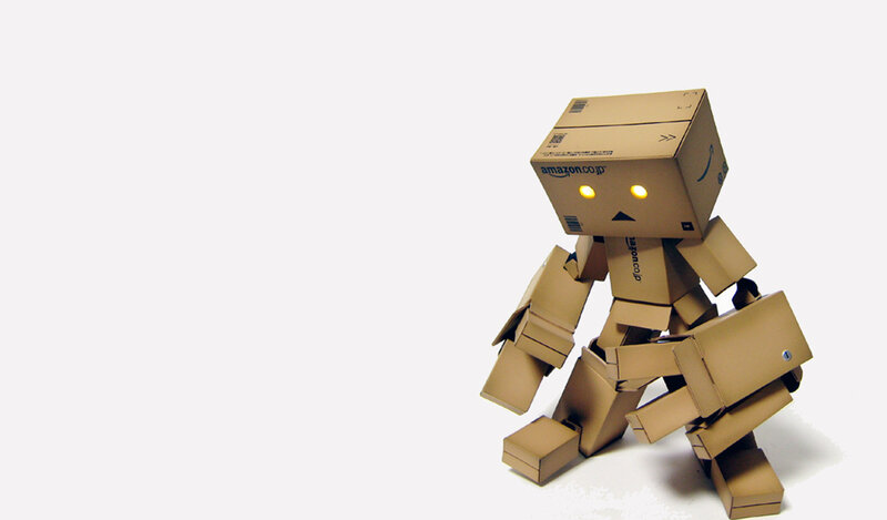Cardboard Robot Figure — Brown, Neutral, Photograph, Box