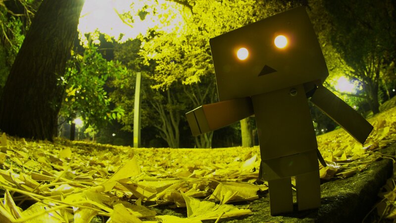 Cardboard Robot Figure — Yellow, Dramatic
