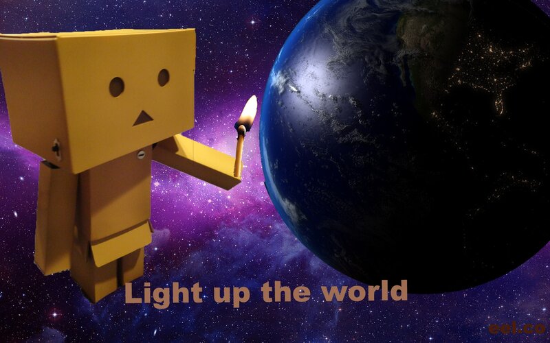 Cardboard Robot Holding Match — Yellow