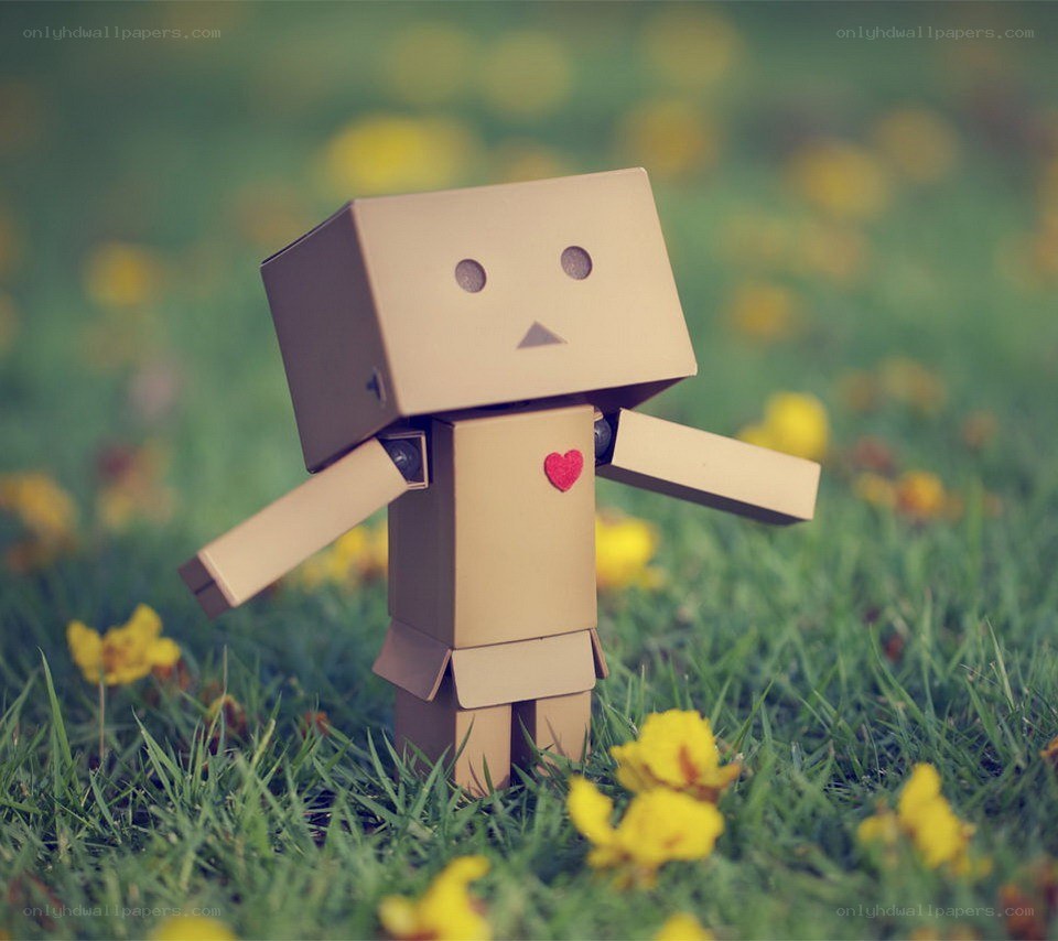 cardboard robot in a field
