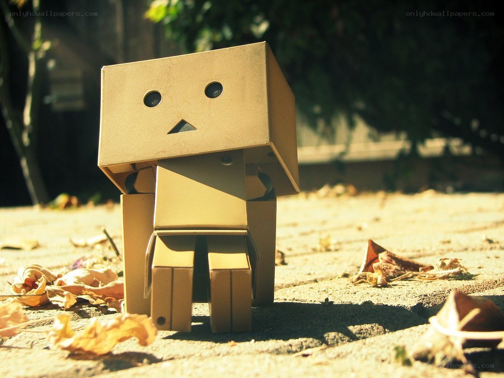 cardboard robot in autumn