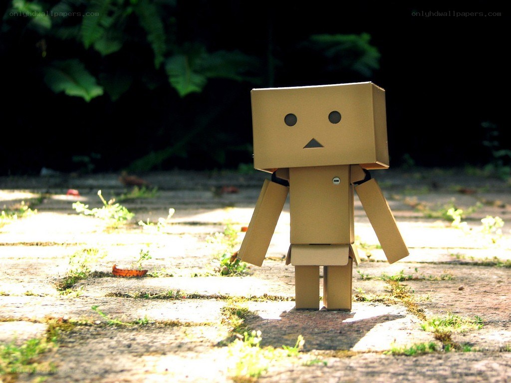 cardboard robot in garden