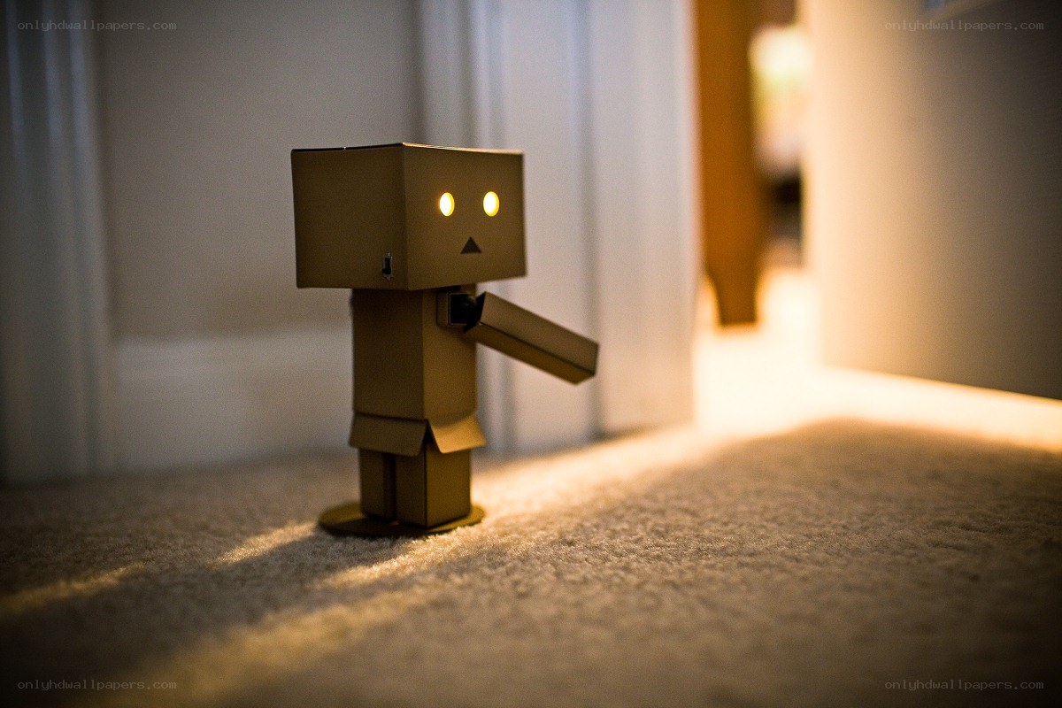 cardboard robot in hallway