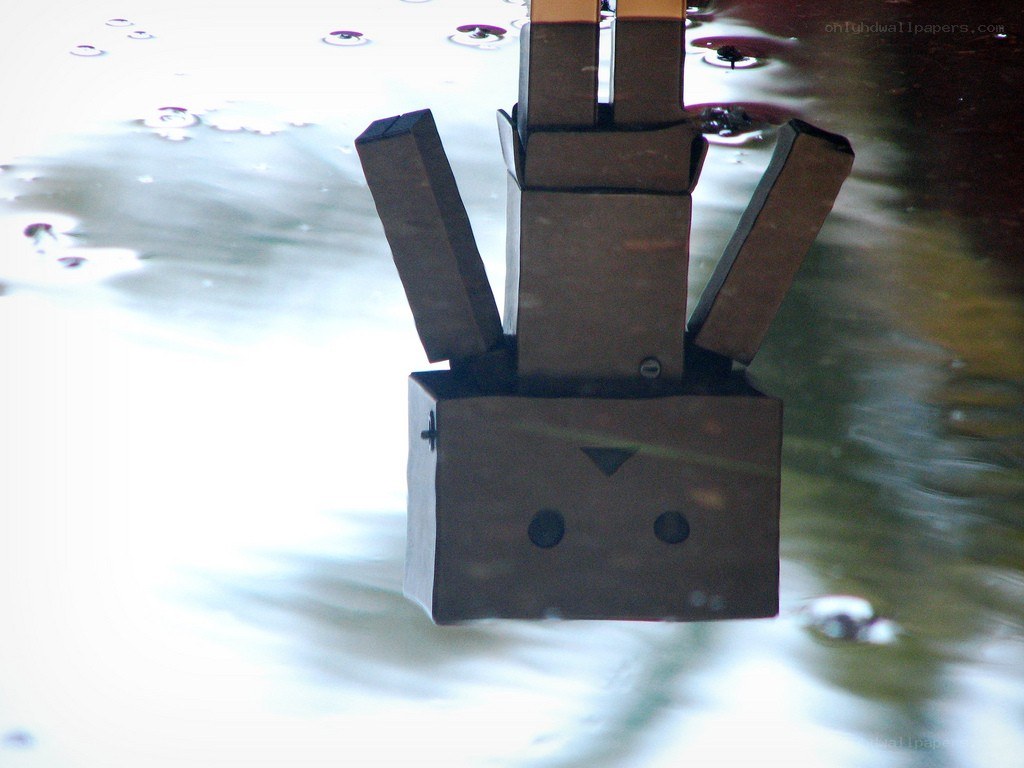 cardboard robot in water