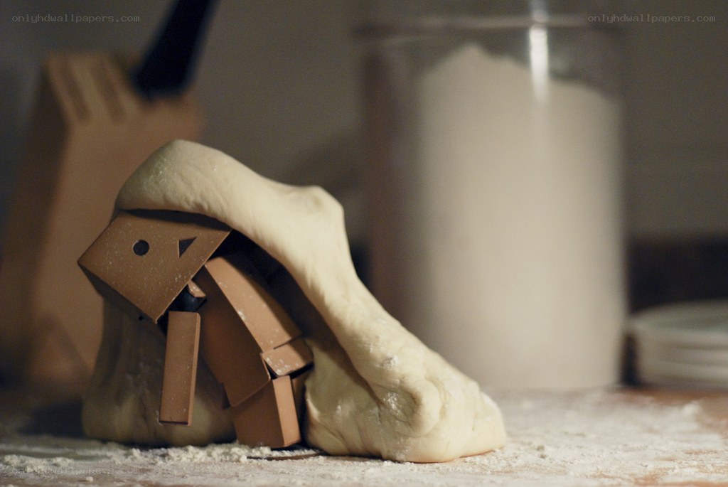 cardboard robot kneading dough