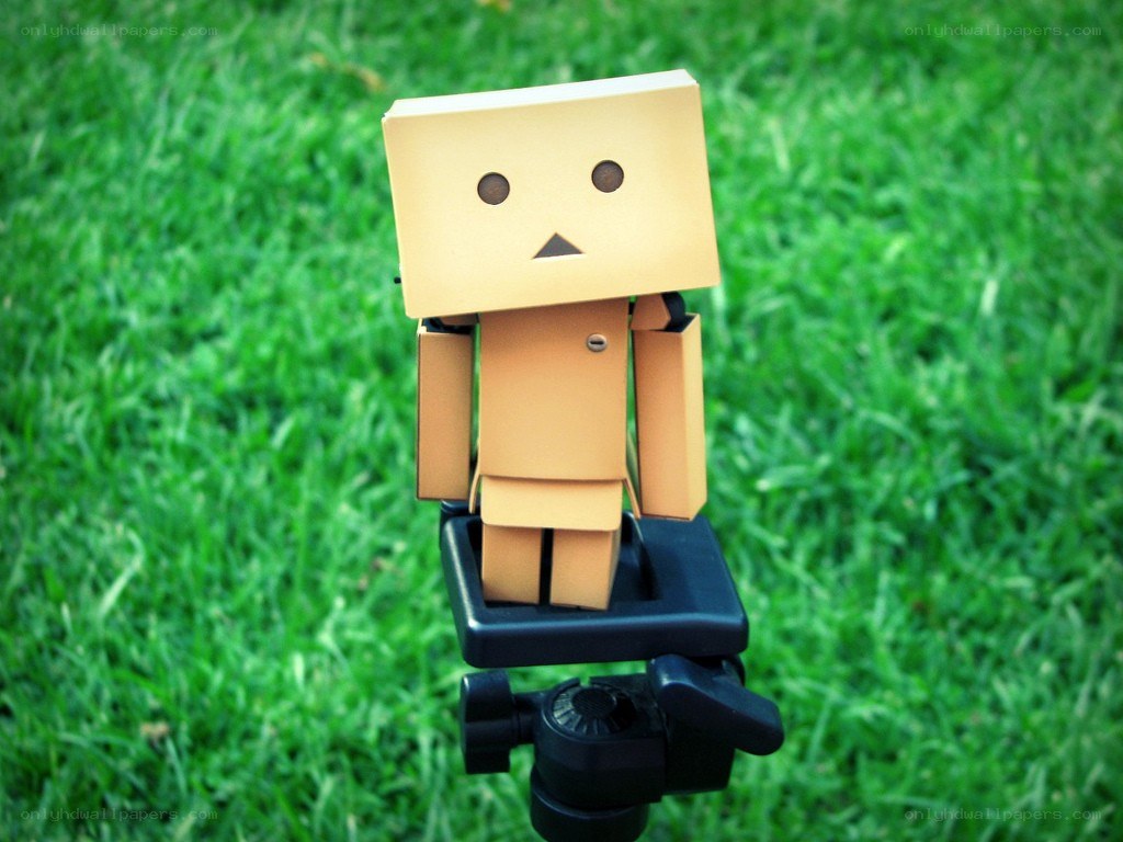 Cardboard robot on a tripod