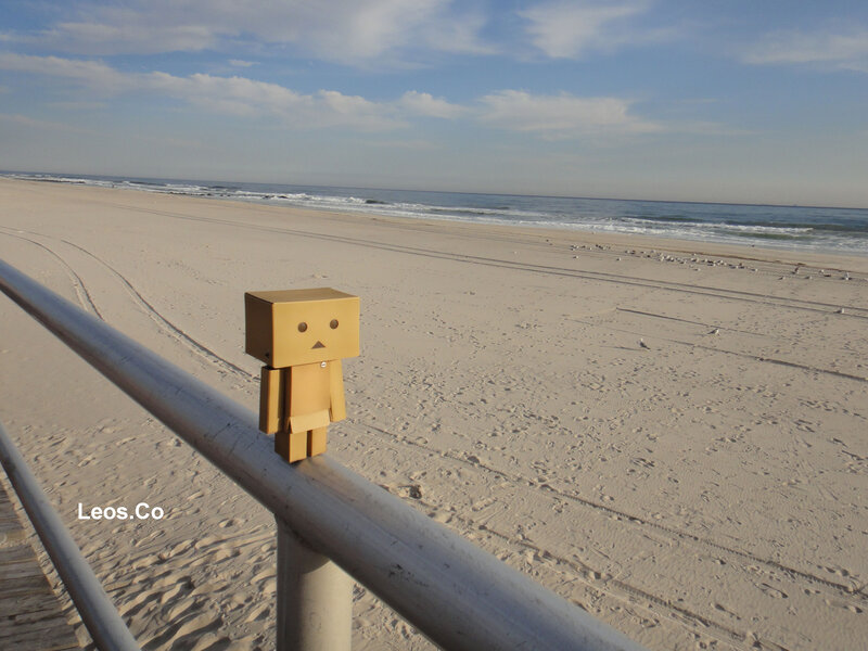 Cardboard Robot on Railing