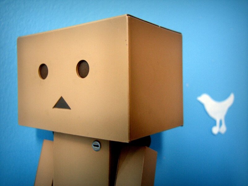 cardboard robot with bird