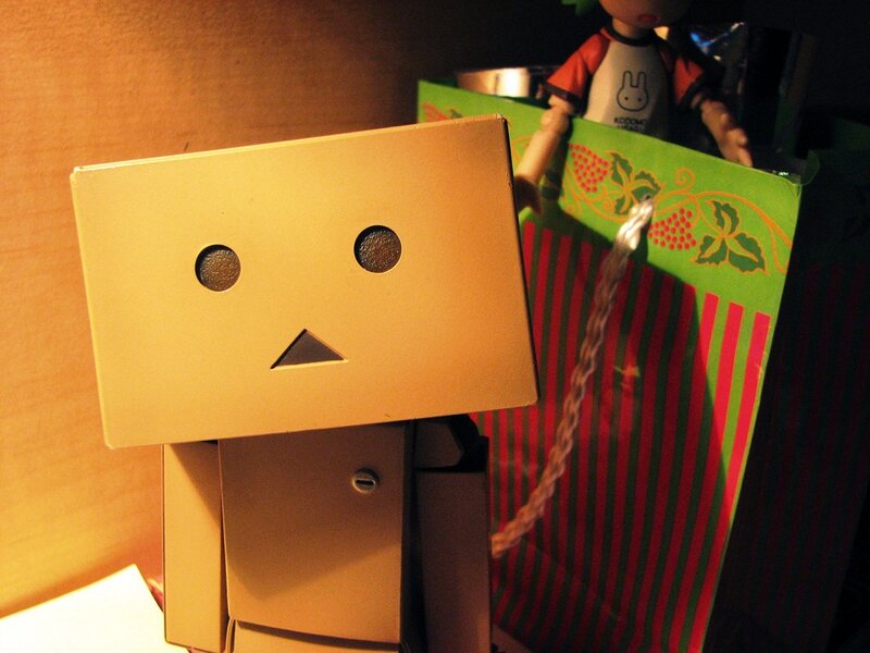 cardboard robot with gift bag