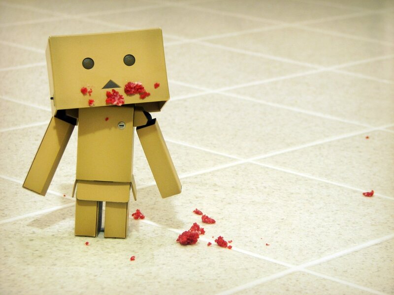 cardboard robot with red splatters