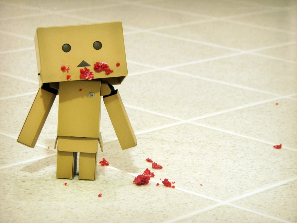 cardboard robot with red splatters