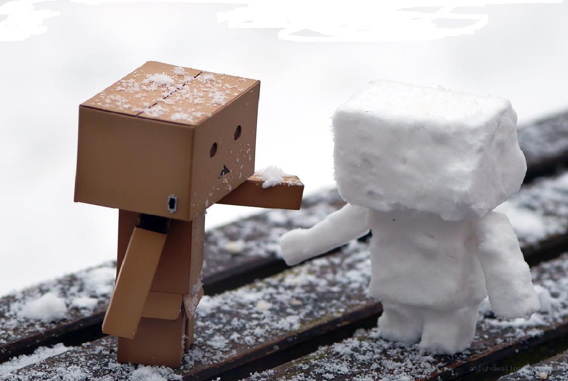 Cardboard robot with snowman