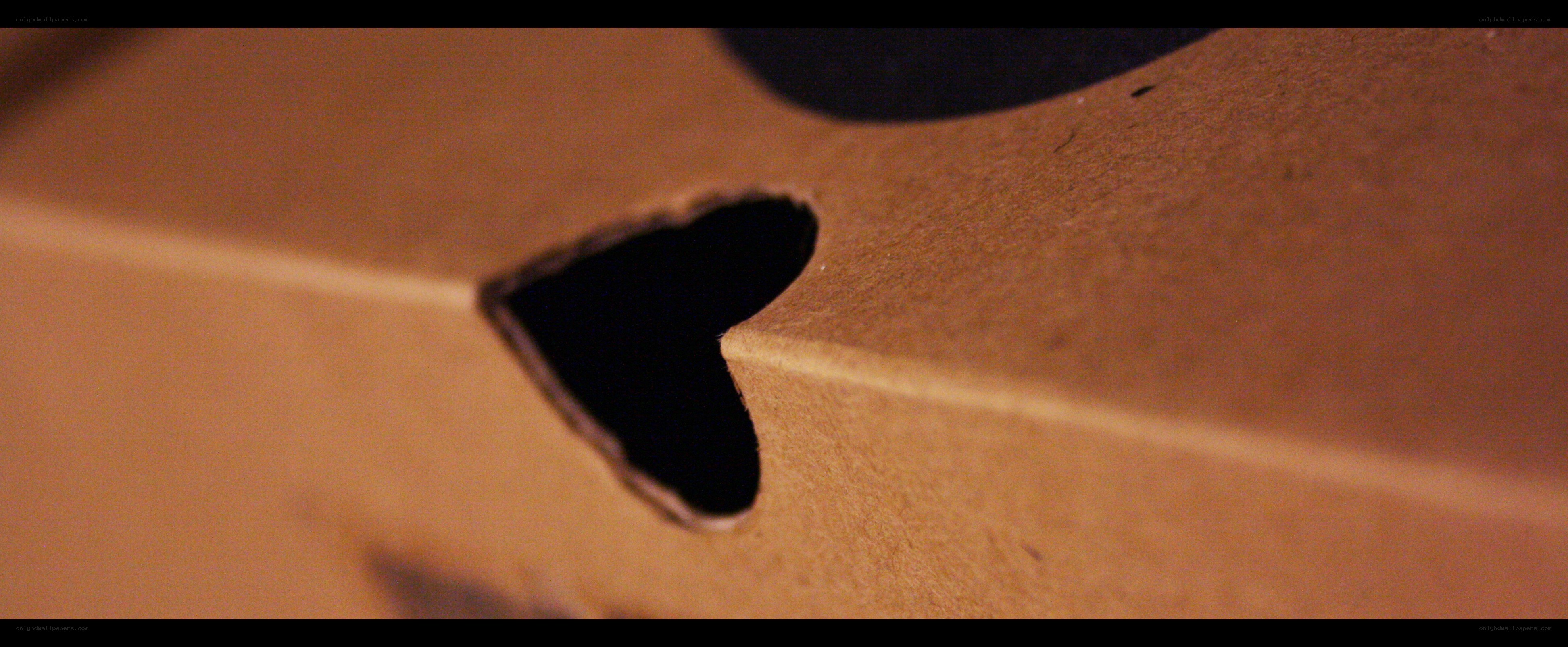 cardboard with heart-shaped cutout