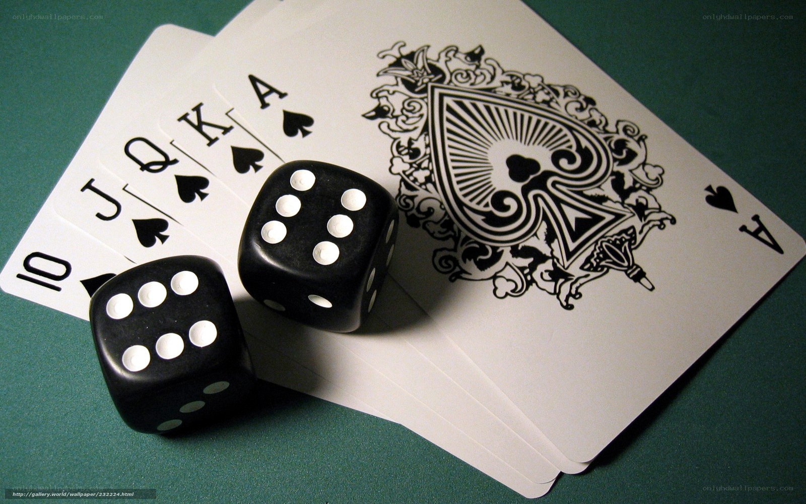 cards and dice on green table