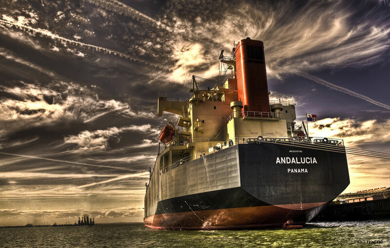 Cargo ship at sunset