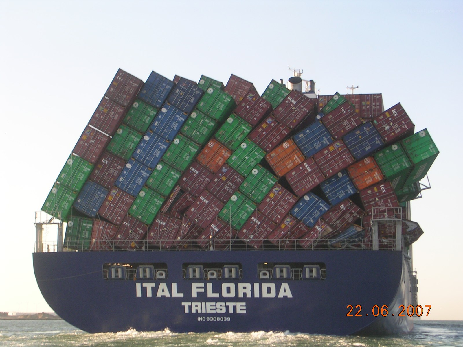 Cargo ship with containers overturned