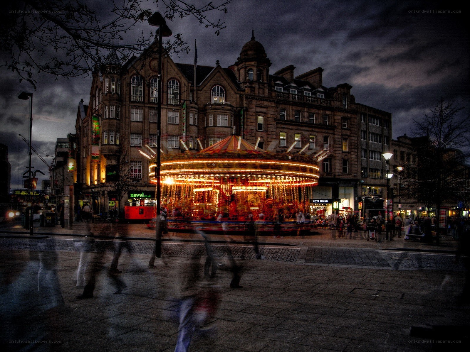 Carousel at dusk in city square