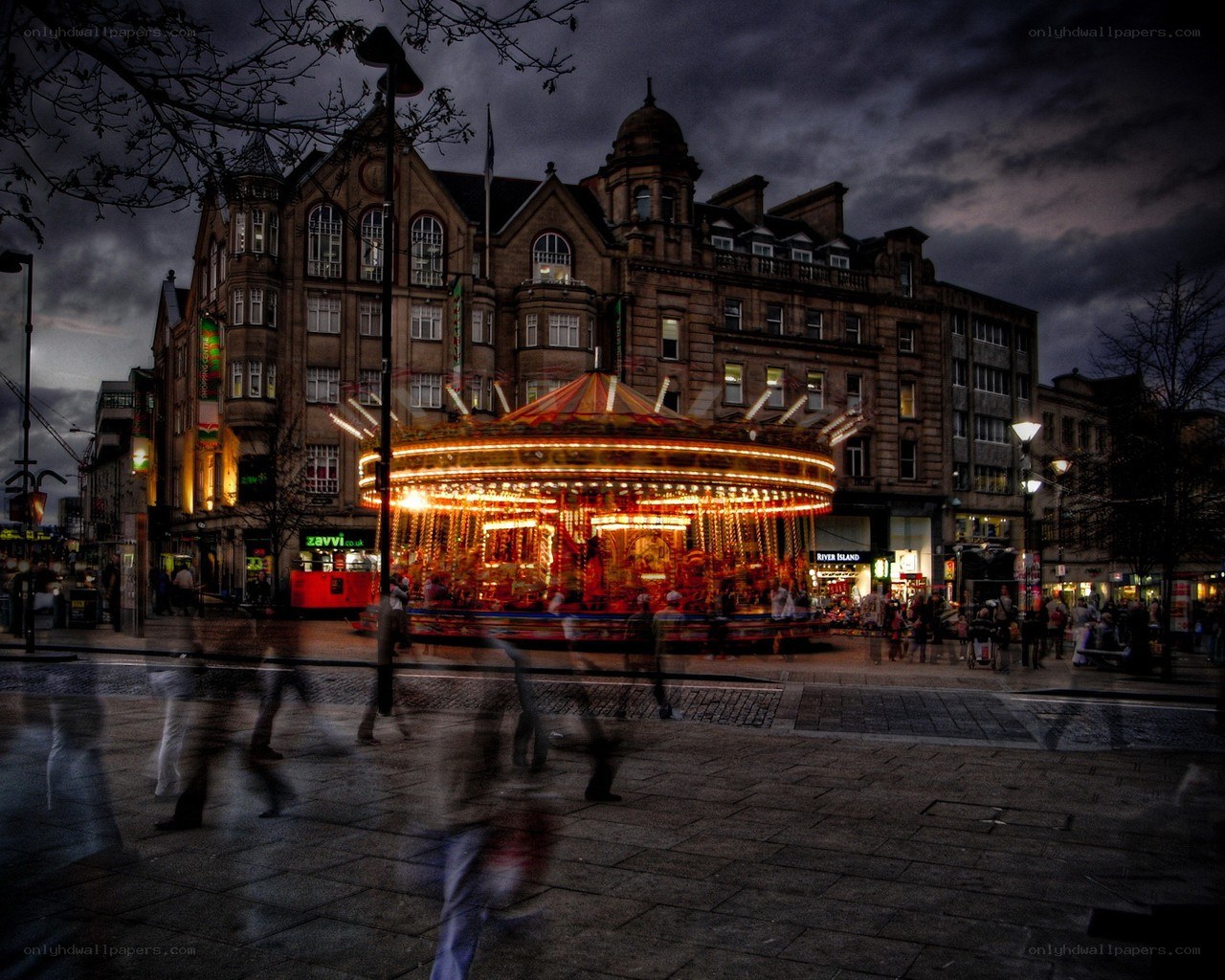 Carousel at dusk in city square