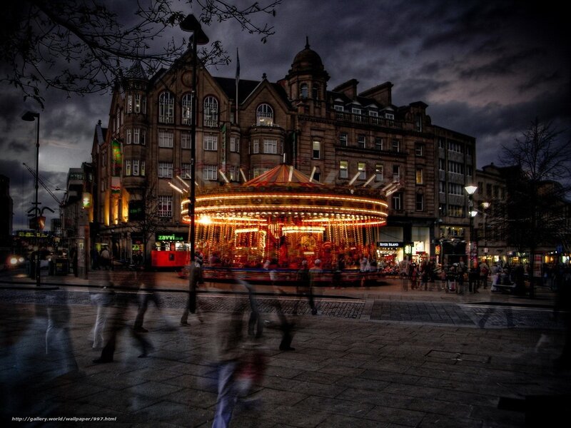 Carousel at dusk in city square