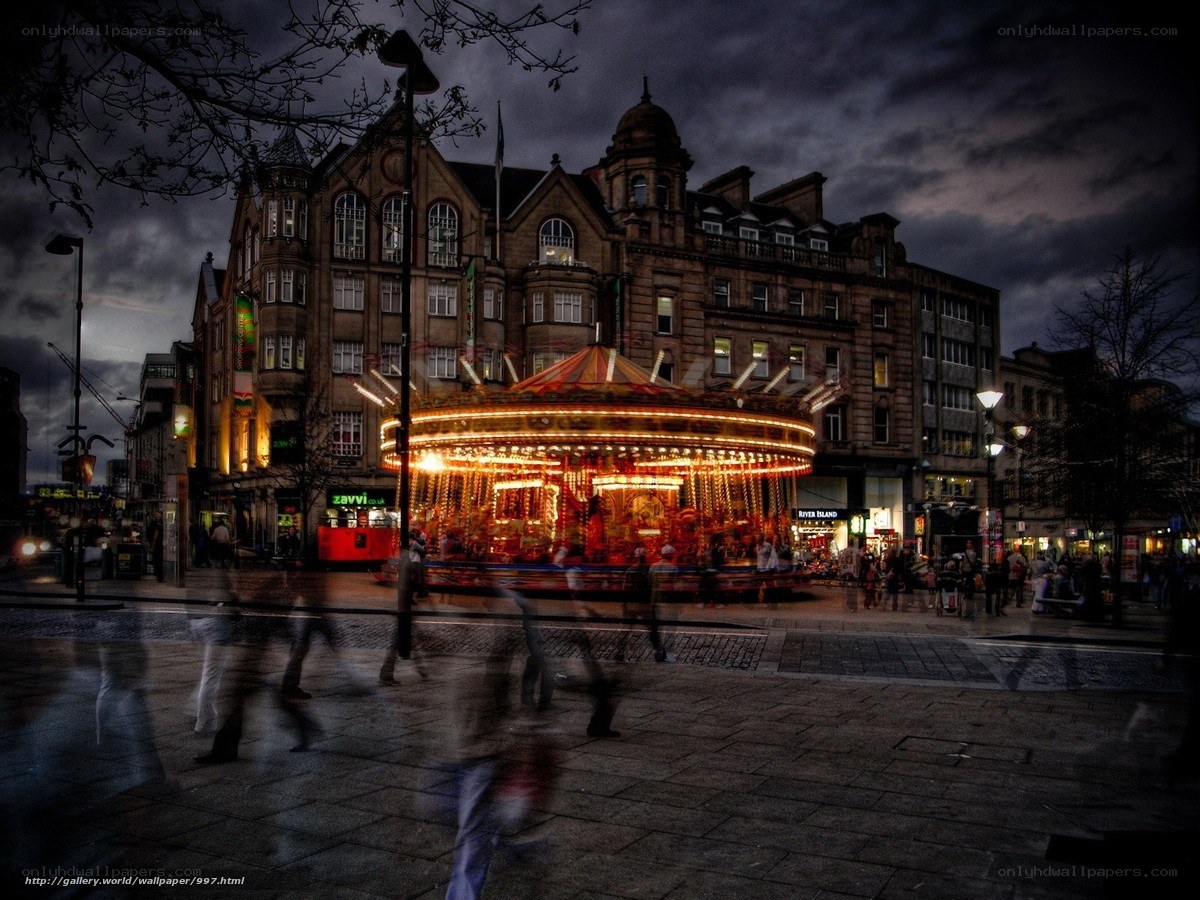 Carousel at dusk in city square