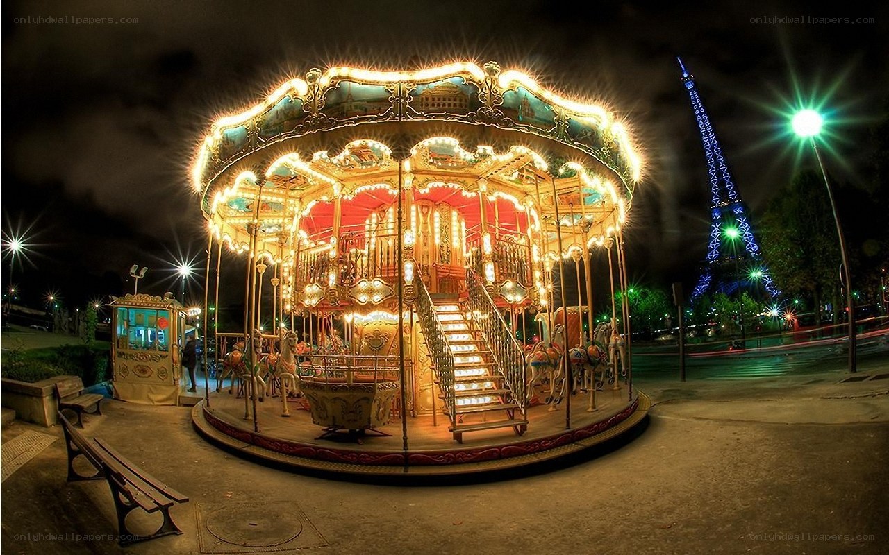 Carousel near Eiffel Tower at night
