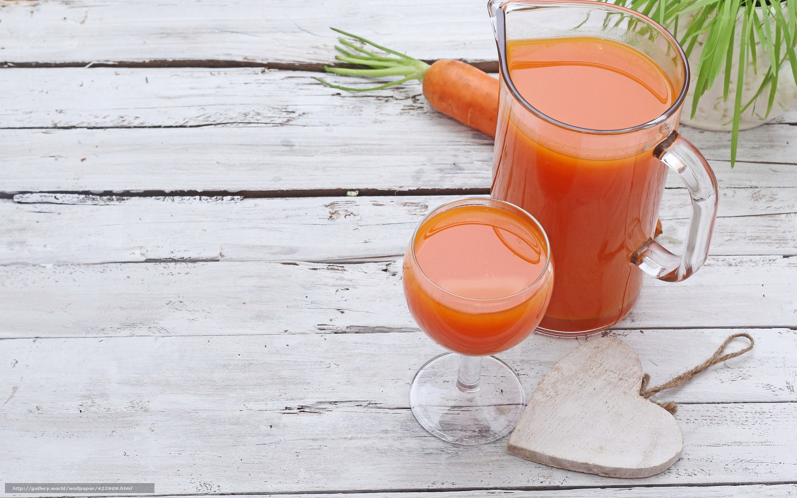 Carrot juice on wooden table
