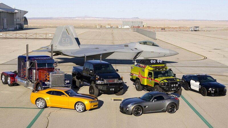 Cars and a Jet on Tarmac — Gray, Dramatic