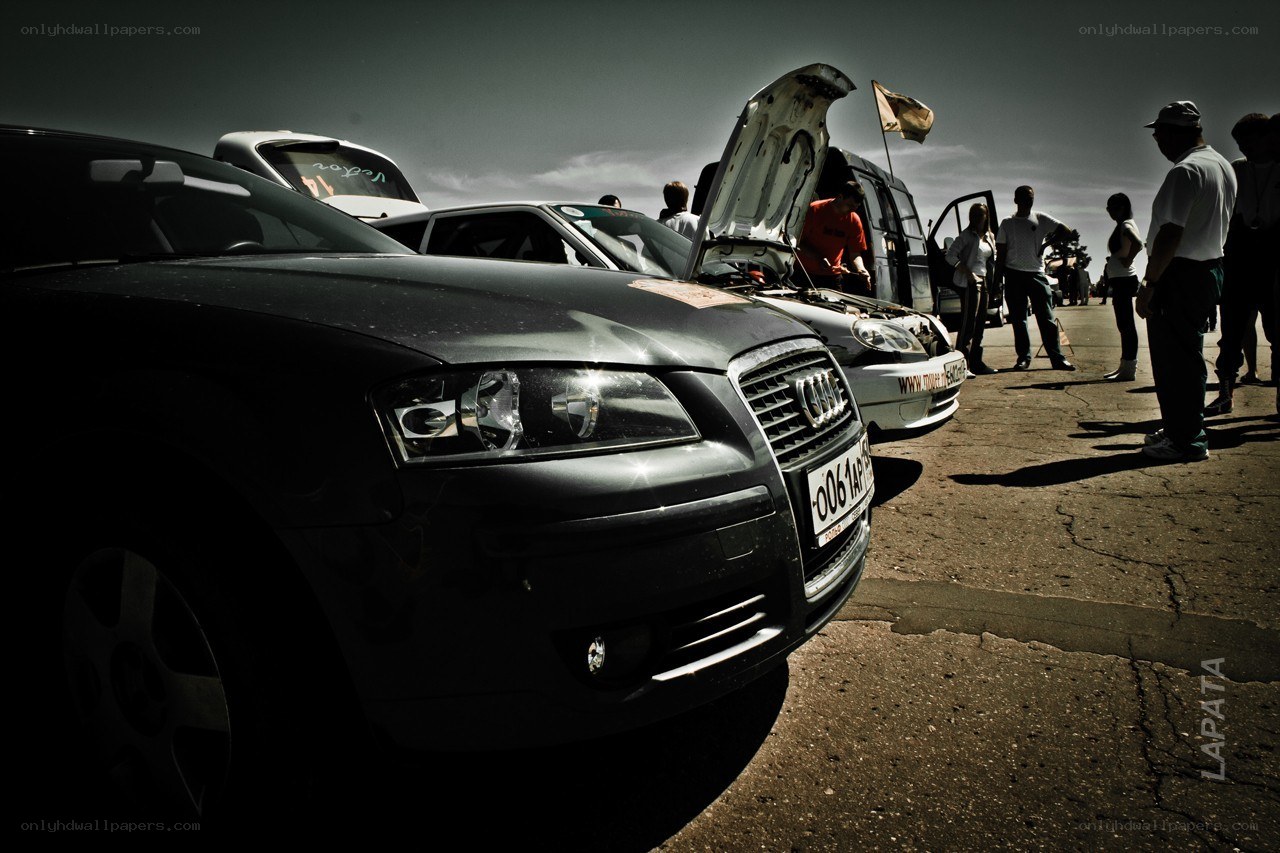 Cars at a gathering