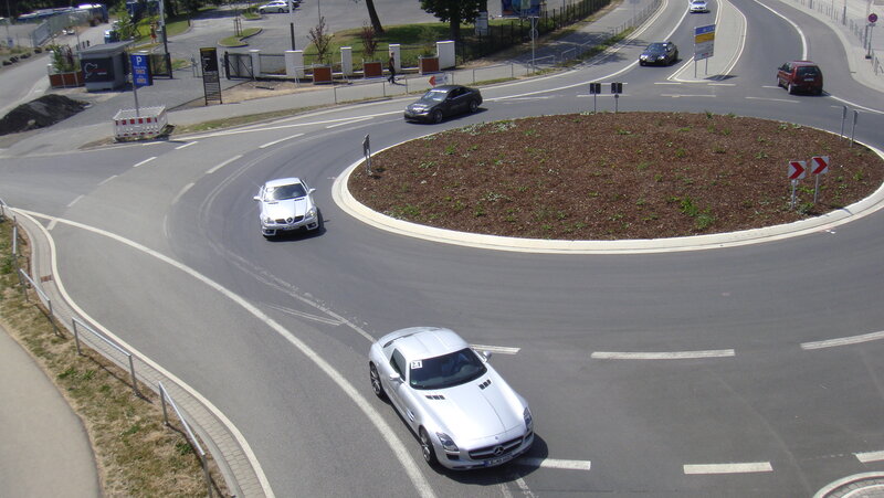 Cars at a roundabout intersection