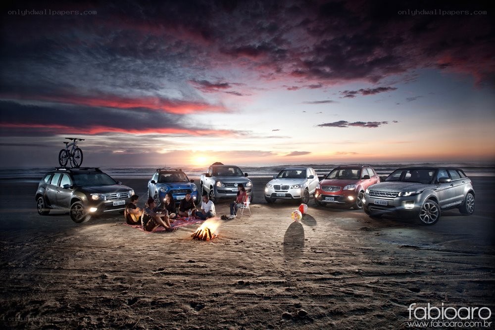 Cars at beach campfire