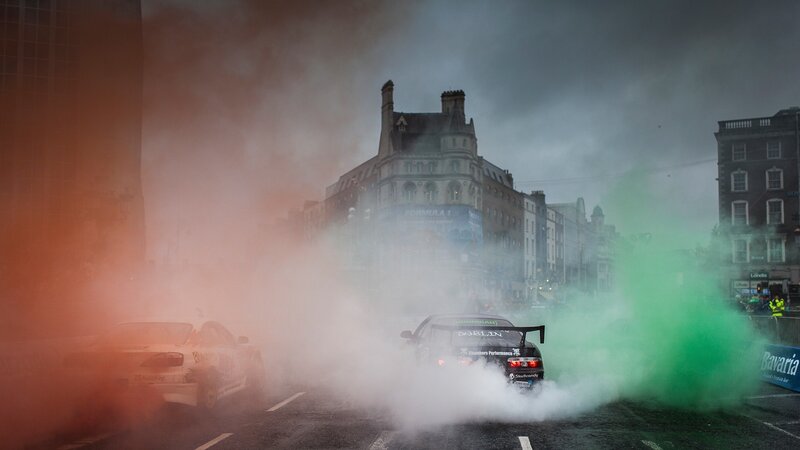 Cars drifting in city smoke