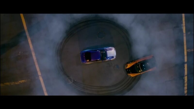 cars drifting in smoke