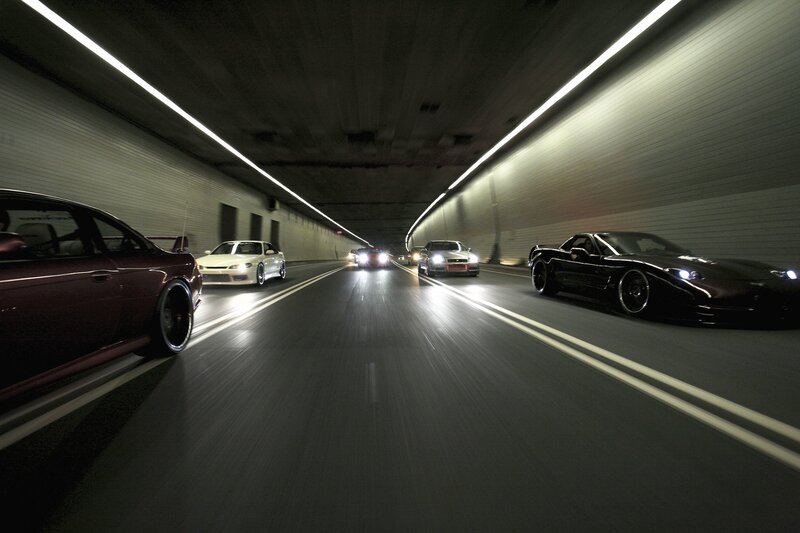 cars driving in a tunnel