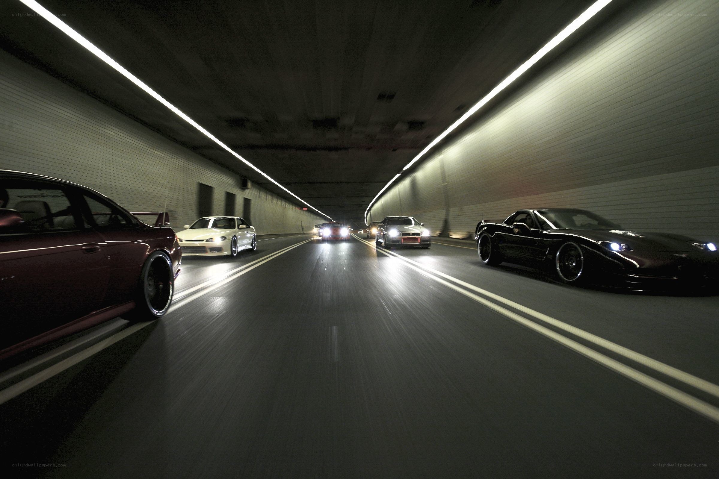 cars driving in a tunnel
