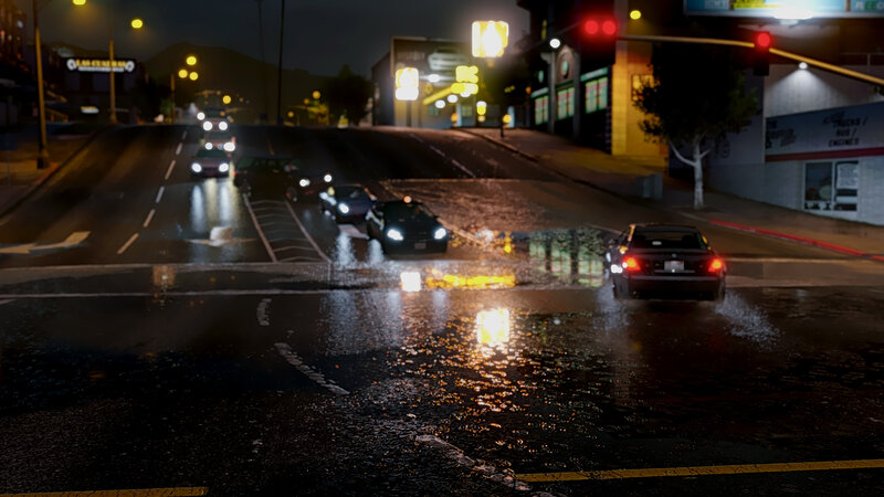 Cars Driving in Rain