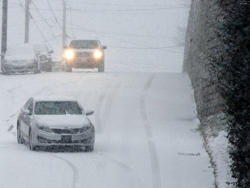 Cars Driving in Snow