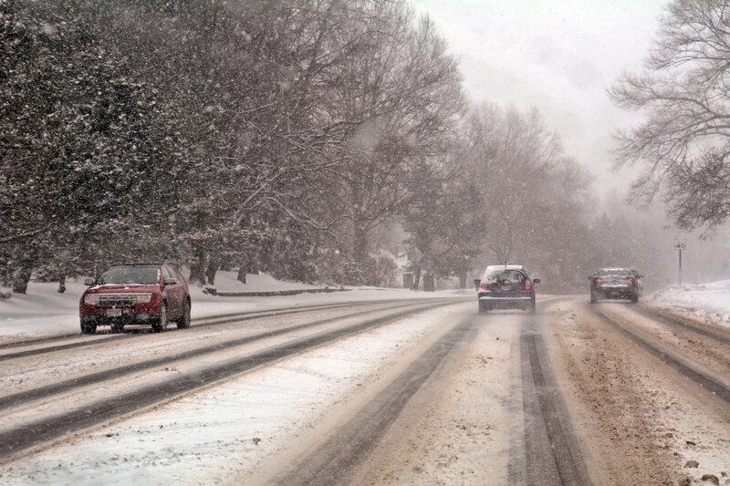 Cars Driving in Snow — White