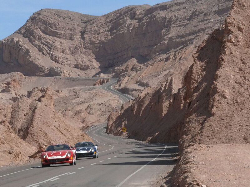 Cars driving on a desert road