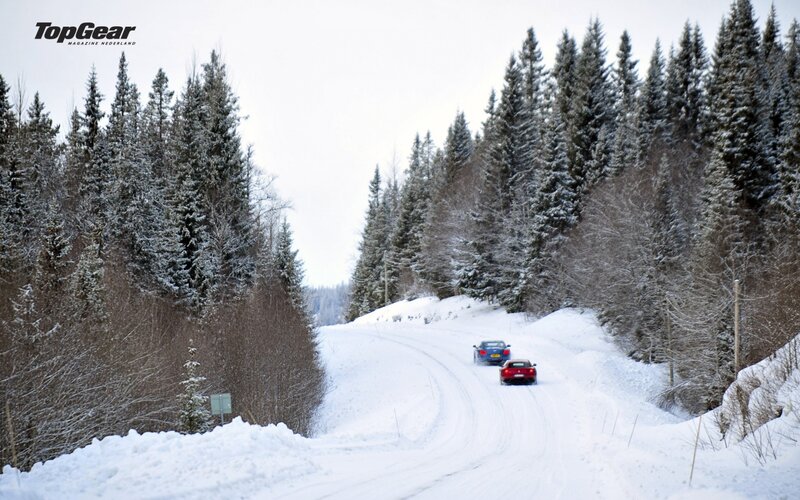 Cars driving on a snowy road