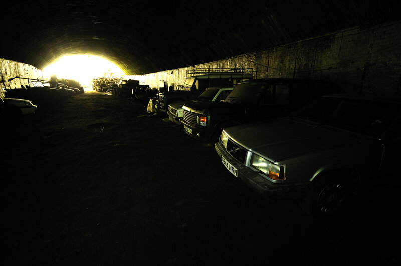 Cars in a dark tunnel