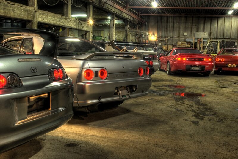 Cars in a garage at night