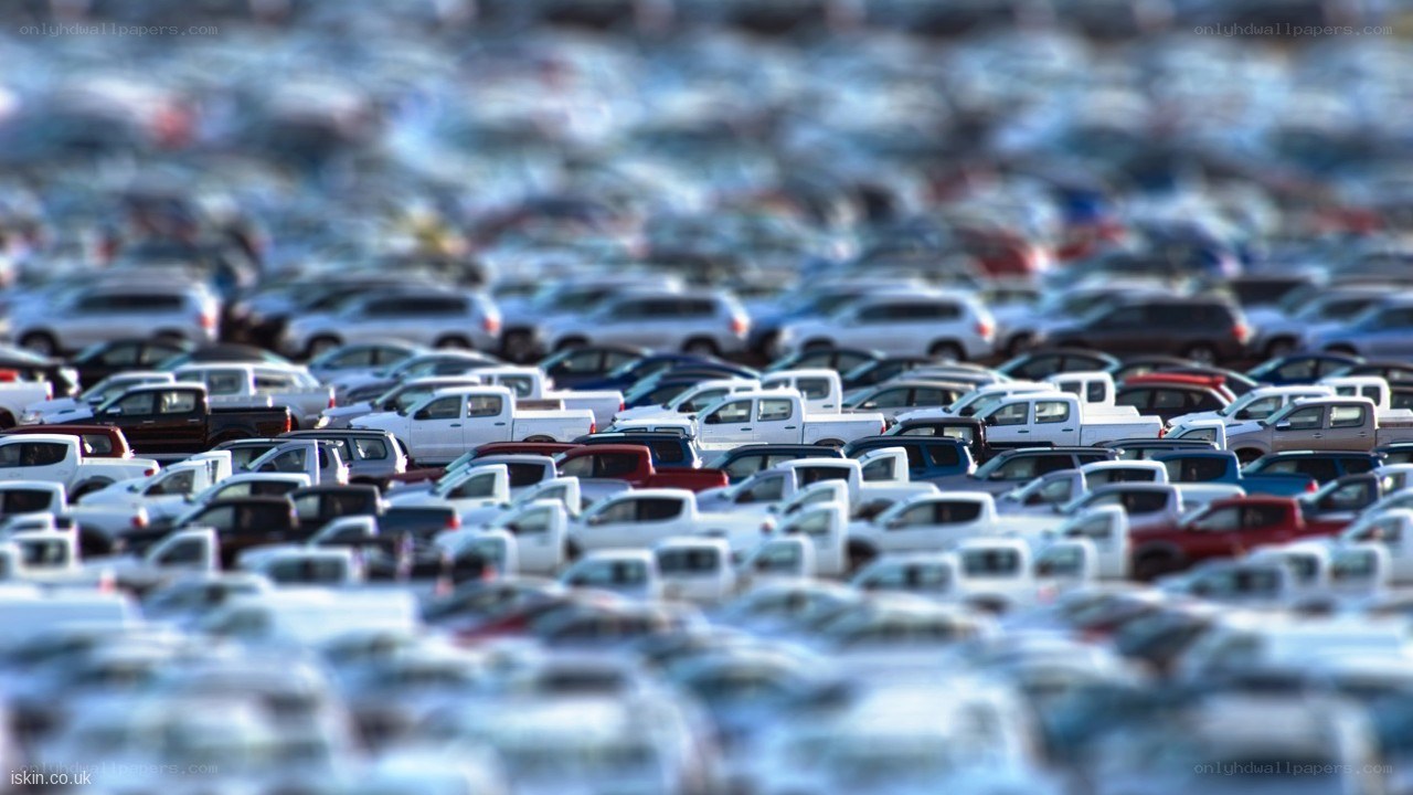 Cars in a large lot