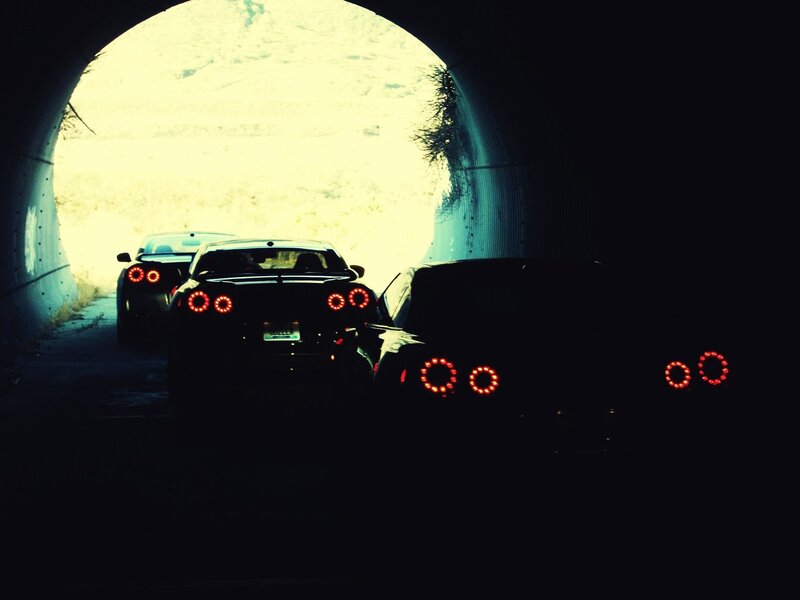 Cars in a tunnel at night