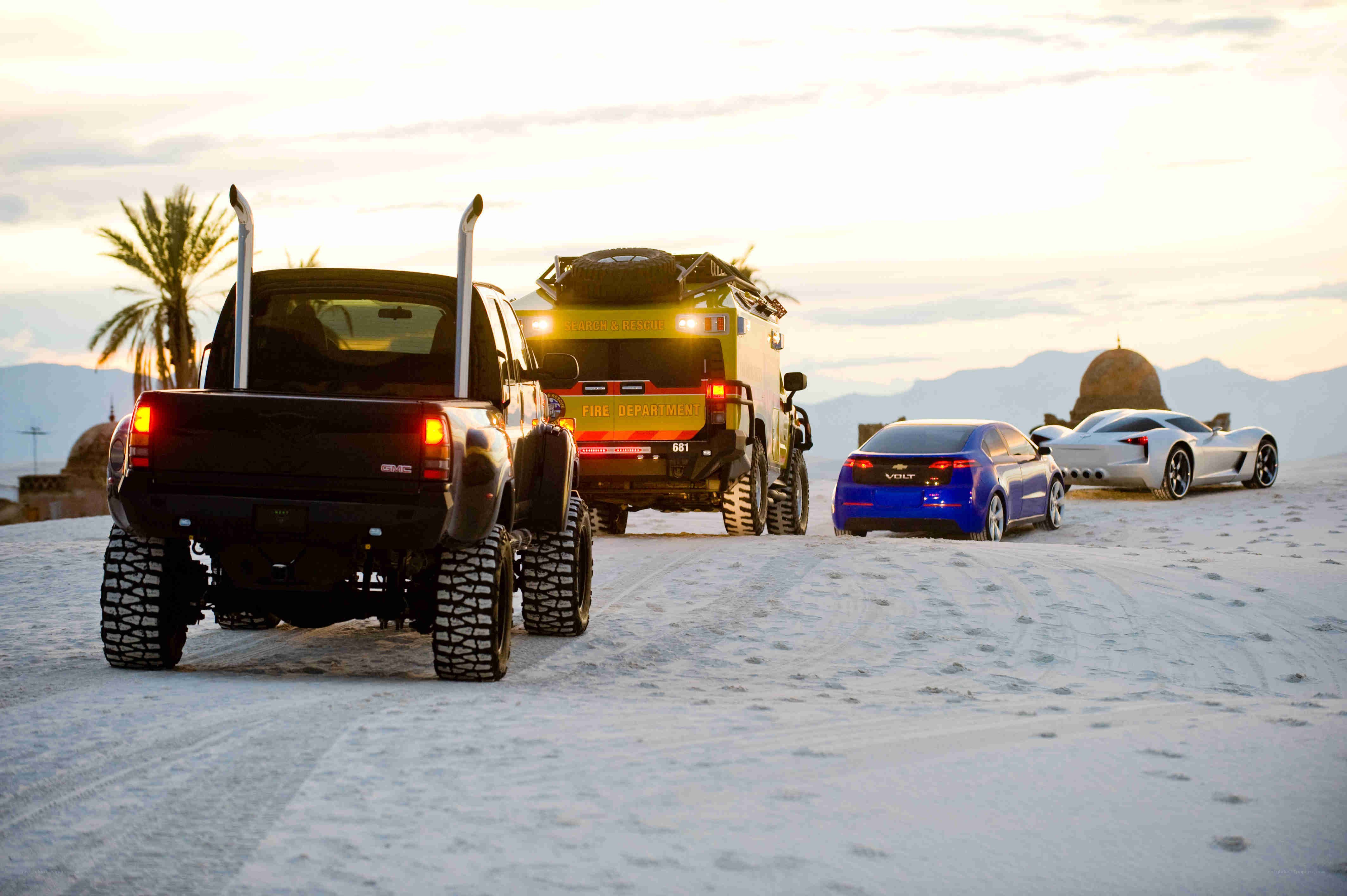 Cars in desert convoy