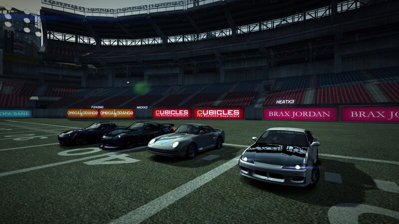 cars in stadium at night
