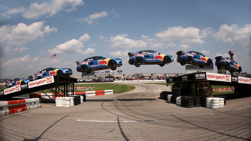 Cars jumping over ramps